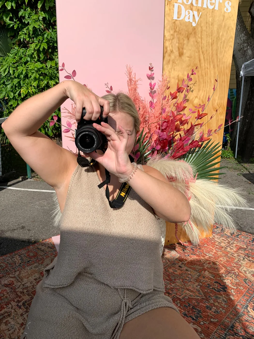Shooting a Mother's Day floral backdrop set on location
