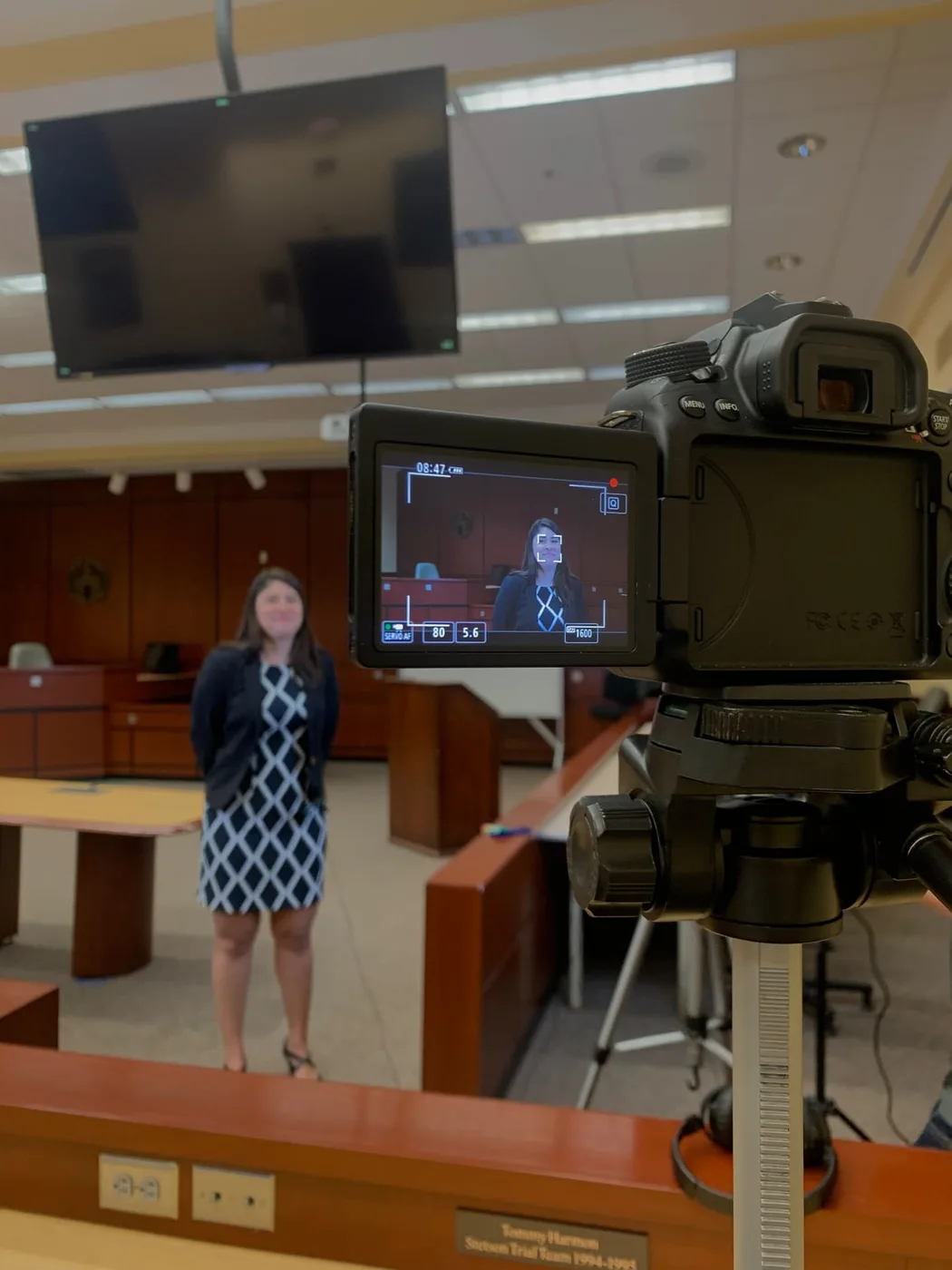 Directing an on-camera interview in a courtroom setting