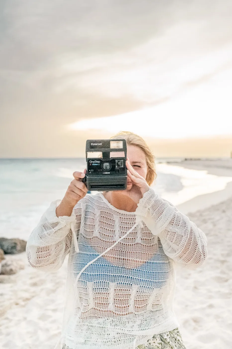 Shooting with a Polaroid OneStep on the beach at golden hour